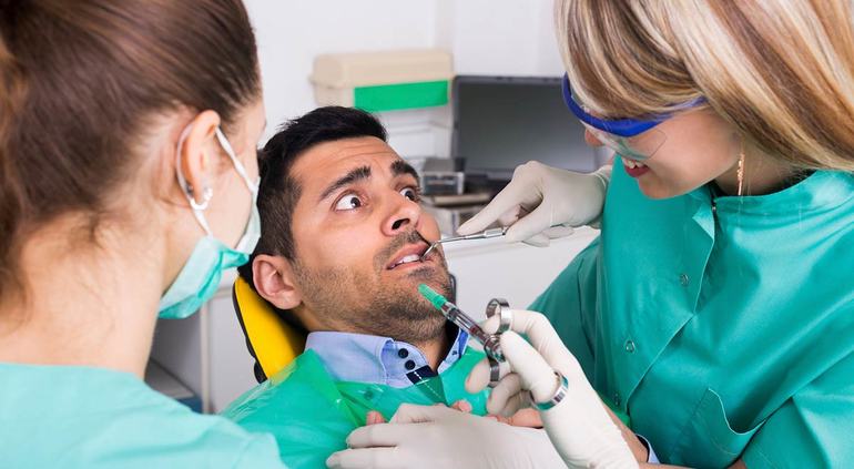 Поход к стоматологу предвещает мужчине сильные опасения