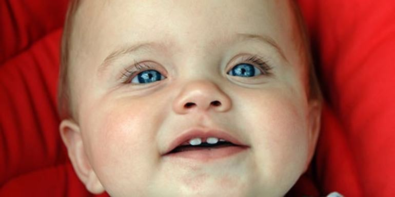 К чему снится что у ребенка вылезли первые зубки